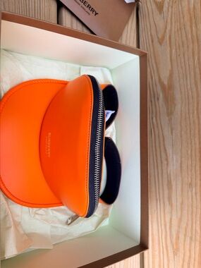 Burberry Bright Orange Leather Visor Case with Silver Zip
